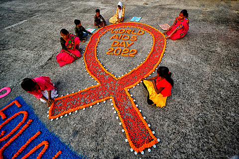 A World Aids Day event in Kolkata in 2022. Across India, community activists battle to counter deep stigma and provide support to those who are HIV-positive, including through the prevention of mother-to-child transmission. Photo: ZUMA / IMAGO