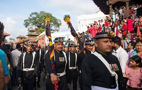 Gurju Paltan parade during the festival in Hanuman Dhoka Durbar Square. (This featured image was added online in 2024, and did not appear in the original print publication.)