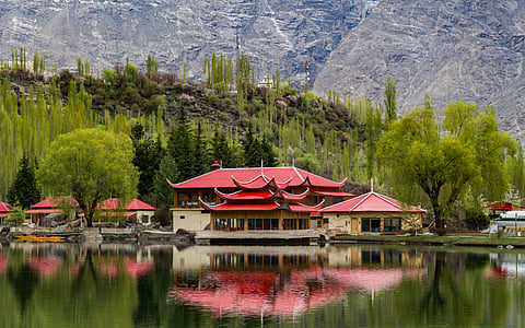Red-roof buildings on the shore of Upper Kachura Lake in Skardu, Pakistan. (This featured image was added online in 2024, and did not appear in the original print publication.)