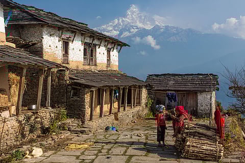 A mother and child at a village in Nepal’s Gandaki Province. In Weena Pun’s novel, the protagonist Kanchhi encounters taboos and restrictions placed on women in Nepali society, while resisting them in small and big ways.