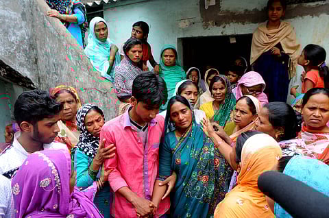The widow (center) of a Muslim man murdered by a cow-protection group in Jharkhand in 2017. The rise of the Bharatiya Janata Party in India has come with a surge in violence against Muslim and Dalit communities by cow-protection vigilantes.