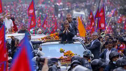Supporters greet Nepal’s former king, Gyanendra Bir Bikram Shah, in Kathmandu in early March 2025.