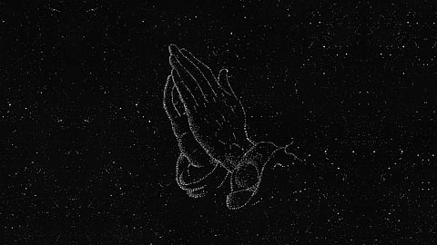 Artwork of a pair of hands in a praying position illustrated with small white dots, resembling a constellation, against a black starry background