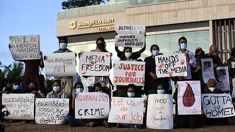 Journalists protest to draw attention to media freedom during a day and night protest in front of the Presidential Secretariat in Colombo, Sri Lanka, on April 18, 2022.