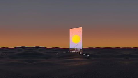 A rectangular mirror in the ocean with the sun in its reflection during sunrise.