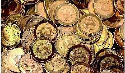 உலகின் முதல் பிட்காயின்- டிஜிட்டல் பணம் வழங்கும் ஏடிஎம் திறப்பு