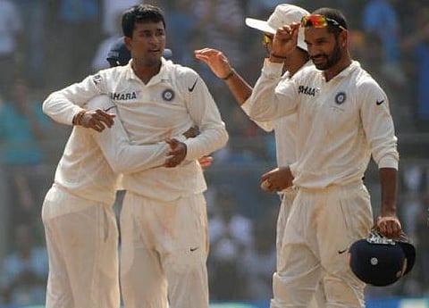 ஓஜா, அஸ்வின் சுழலில் 182 ரன்களில் சுருண்டது மே.இ. தீவுகள்