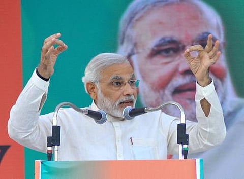 மதக்கலவர வழக்கில் கைதான எம்.எல்.ஏ.க்களுக்கு பாராட்டு: புதிய சர்ச்சையில் மோடி!