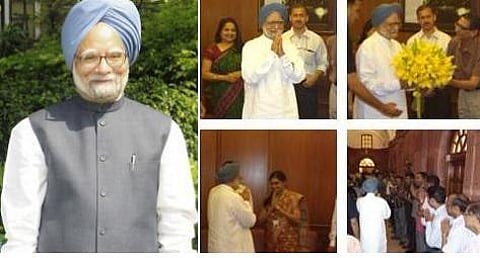 பிரதமர் மன்மோகனுக்கு ஊழியர்கள் பிரியாவிடை: பூங்கொத்து கொடுத்து பாராட்டு