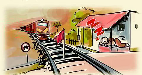 தண்டவாளத்தில் சிவப்பு கொடி நட்டுவிட்டு தூங்கிய கேட்மேன்: 30 நிமிடம் ரயில் போக்குவரத்து பாதிப்பு