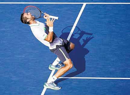 அமெரிக்க ஓபன்: அரையிறுதியில் ஃபெடரர்-சிலிச் மோதல்