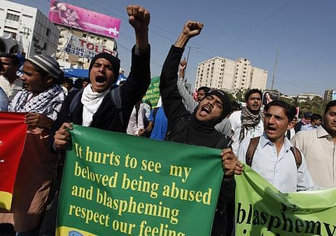 சார்லி ஹெப்டோவுக்கு எதிரான ஆர்பாட்டத்தில் புகைப்பட நிருபர் சுடப்பட்டார்