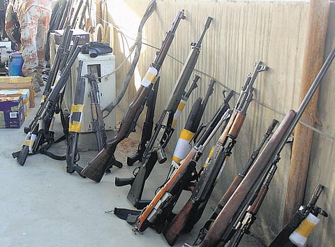 பாகிஸ்தான் ராணுவம் நடத்திய அதிரடி சோதனை: கட்சி அலுவலகத்தில் ஆயுத குவியல்- நேட்டோ படையிடம் திருடப்பட்டவை