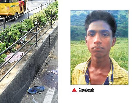 போலீஸ்காரர் லத்தியால் அடித்ததால் விபரீதம்: சாலை தடுப்பு சுவரில் பைக் மோதி இளைஞர் பலி - உறவினர்கள் மறியல்; போலீஸ் வாகனம் உடைப்பு