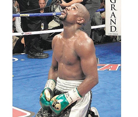 உலக ‘வெல்டர் வெயிட்’பட்டத்துடன் ஓய்வு பெற்றார் மே வெதர்