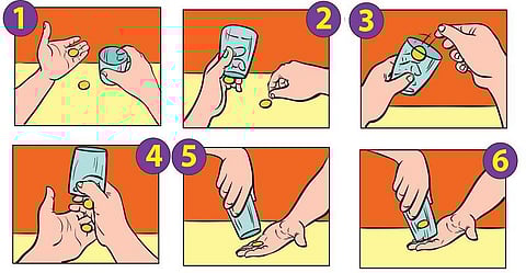 மேஜிக்... மேஜிக்...கண்ணாடிக்குள் நுழையுமா காசு?