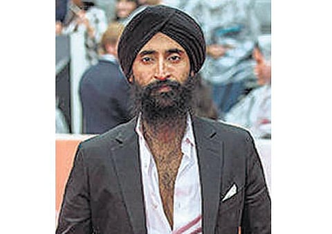 டர்பனால் அனுமதி மறுக்கப்பட்ட விவகாரம்: சீக்கியரிடம் மன்னிப்பு கேட்டது விமான நிறுவனம்