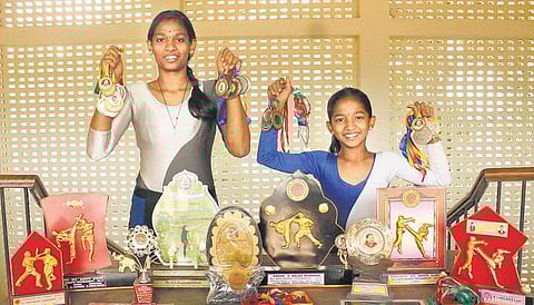 வானவில் பெண்கள்: வில்லாக வளையும் சாதனை சகோதரிகள்!