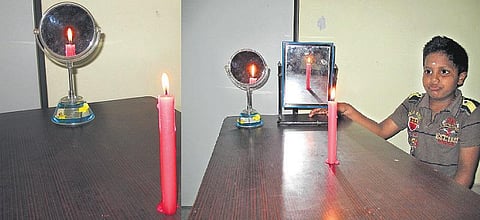 கண்ணாடிக்குள் ஒரு மாய அறிவியல்