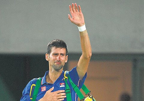 145-வது இடத்தில் உள்ள வீரரிடம் முதல் சுற்றிலேயே வீழ்ந்தார் ஜோகோவிச்; வில்லியம்ஸ் சகோதரிகள் வெளியேற்றம்