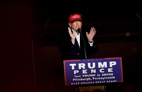 ஹிலாரியை காப்பது தில்லுமுல்லு அமைப்பு முறையே: டிரம்ப்