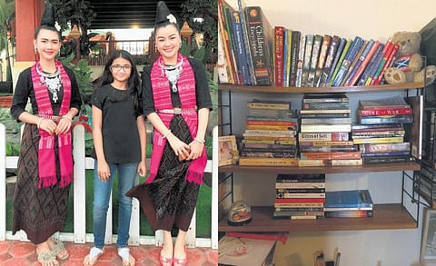 புத்தகங்களால் உலகைக் கடக்கும் சிறுமி!