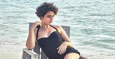 நீச்சல் உடை புகைப்படத்தை பதிவேற்றிய நடிகைக்கு கடும் எதிர்ப்பு