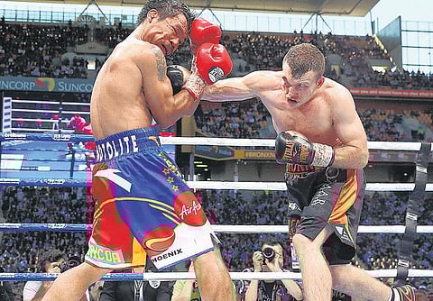 உலக சாம்பியன் குத்துச்சண்டை போட்டி: பக்வாயோவை வென்றார் ஜெப் ஹார்ன்