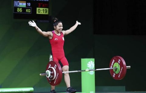 21-வது காமன்வெல்த் போட்டி: இந்தியாவுக்கு முதல் தங்கம்; மீராபாய் சானு சாதனை