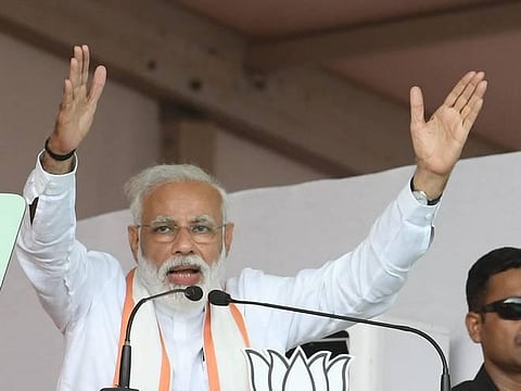 அமித் ஷாவை சிறைக்கு அனுப்பி என் ஆட்சியை கவிழ்க்கப் பார்த்தது ஐமுகூ அரசு: பிரதமர் நரேந்திர மோடி பகீர் குற்றச்சாட்டு