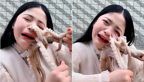 ஆக்டோபஸை உயிருடன் சாப்பிட முயன்ற இளம்பெண்ணுக்கு நேர்ந்த கதி: வைரலாகும் வீடியோ