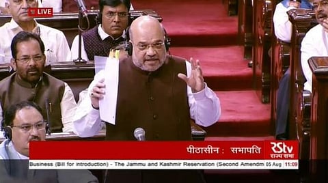 காஷ்மீருக்கு சிறப்பு அந்தஸ்து வழங்கும் 370 சட்டப்பிரிவு ரத்து: கடும் அமளிக்கு இடையே மாநிலங்களவையில் அமித் ஷா அறிவிப்பு