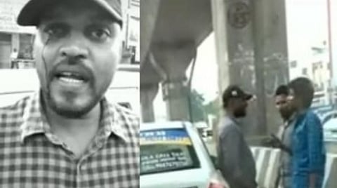 நடுசாலையில் கால் டாக்ஸி ஓட்டுநருடன் வாக்குவாதம் செய்யும் நபர்கள்