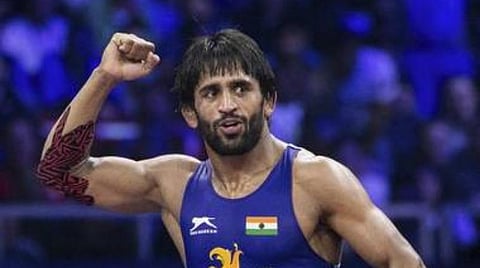 உலக மல்யுத்தத்தில் அரை இறுதிக்கு முன்னேறியதால் பஜ்ரங், ரவி ஒலிம்பிக் போட்டிக்கு தகுதி