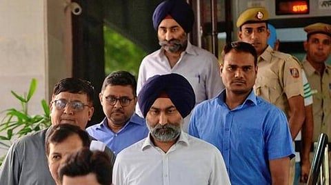 பண மோசடி வழக்கில் ரான்பாக்ஸி நிறுவனத்தின் முன்னாள் நிறுவனர்கள் கைது