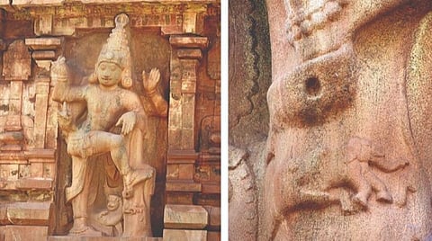 துவாரபாலகர்களின் சிற்பத்தின் காலடியில் வடிக்கப்பட்டுள்ள ஒரு பாம்பு யானையை விழுங்கும் சிற்பம்.