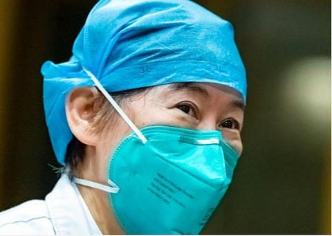 கரோனாவை முதலில் கண்ட சீன மருத்துவர் ஜாங் ஜிக்சியான்.