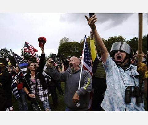 அமெரிக்க வலதுசாரி பிரவுட்பாய்ஸ் குழுவின் கோஷம்.