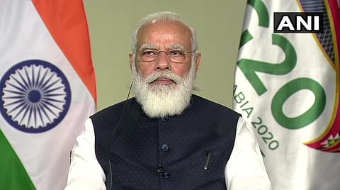 காணொலி வாயிலாக நடந்த ஜி20 நாடுகள் மாநாட்டில் பிரதமர் மோடி பேசிய காட்சி : படம் ஏஎன்ஐ
