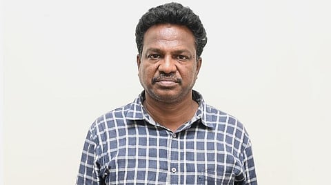 கைதான வெங்கடேசன்.