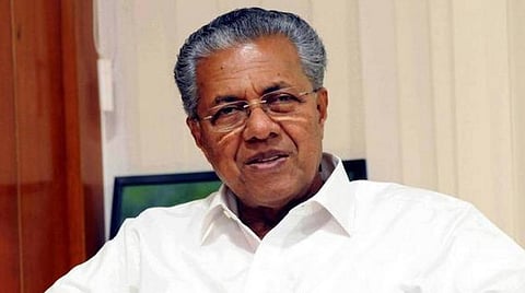 கேரள மாநிலம் தர்மடம் தொகுதியில் போட்டியிட, மாநில முதல்வர் பினராயி விஜயன் நேற்று கன்னூர் தேர்தல் அலுவலகத்தில் வேட்பு மனு தாக்கல் செய்தார். படம்: பிடிஐ