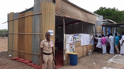 காரைக்குடி அருகே தகரக் கொட்டகையில் செயல்பட்ட வாக்குச்சாவடி மையம்; வெயில் தாக்கத்தால் வாக்காளர்கள், அலுவலர்கள் சிரமம்