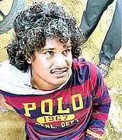 கைதான சிலம்பரசன்.