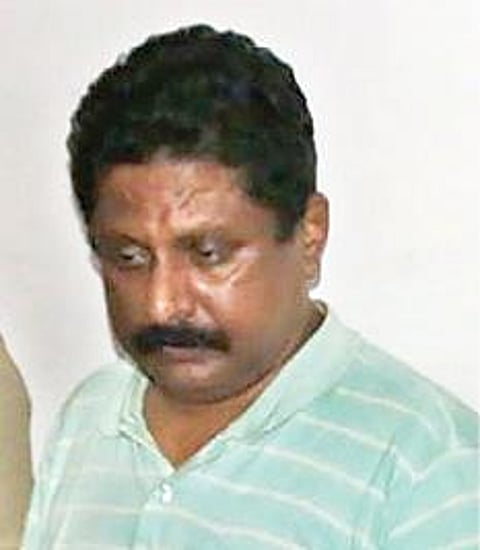 கைதான பன்னீர்செல்வம்.