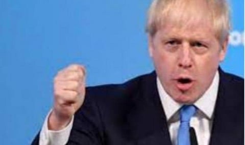 முகக்கவசம் இனி கட்டாயம் அல்ல: கரோனா கட்டுப்பாடுகளைத் தளர்த்தும் பிரிட்டன்