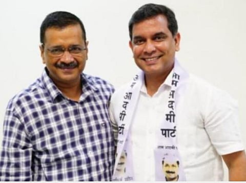 டெல்லி முதல்வர் அரவிந்த் கேஜ்ரிவால் மற்றும் ஆம் ஆத்மி முதல்வர் வேட்பாளர் அமித் பலேகர்