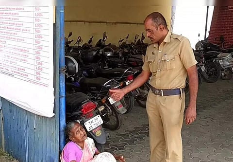 மூதாட்டியை கீழே தள்ளிவிட்ட போலீஸ் ஏட்டு பணியிடை நீக்கம்