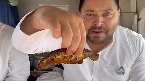 நவராத்திரி நாளில் வறுத்த மீன் சாப்பிடலாமா? - விமர்சனத்துக்கு உள்ளான தேஜஸ்வி யாதவ்