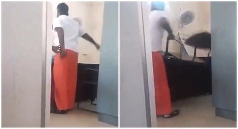 சிவகங்கையில் இருக்கையை எடுத்து பெண் அதிகாரியை தாக்க முயன்ற திமுக பிரமுகர்: ஊழியர்கள் போராட்டம்