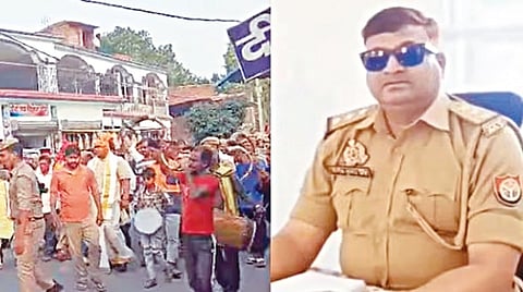 பணியிட மாற்றம் செய்யப்பட்ட காவல் துறை அதிகாரியை மேளதாளத்துடன் ஊர்வலமாக அழைத்துச் சென்று பிரியாவிடை கொடுக்கும் உள்ளூர் மக்கள். அடுத்த படம். காவல் அதிகாரி வினோத் குமார் சிங்.